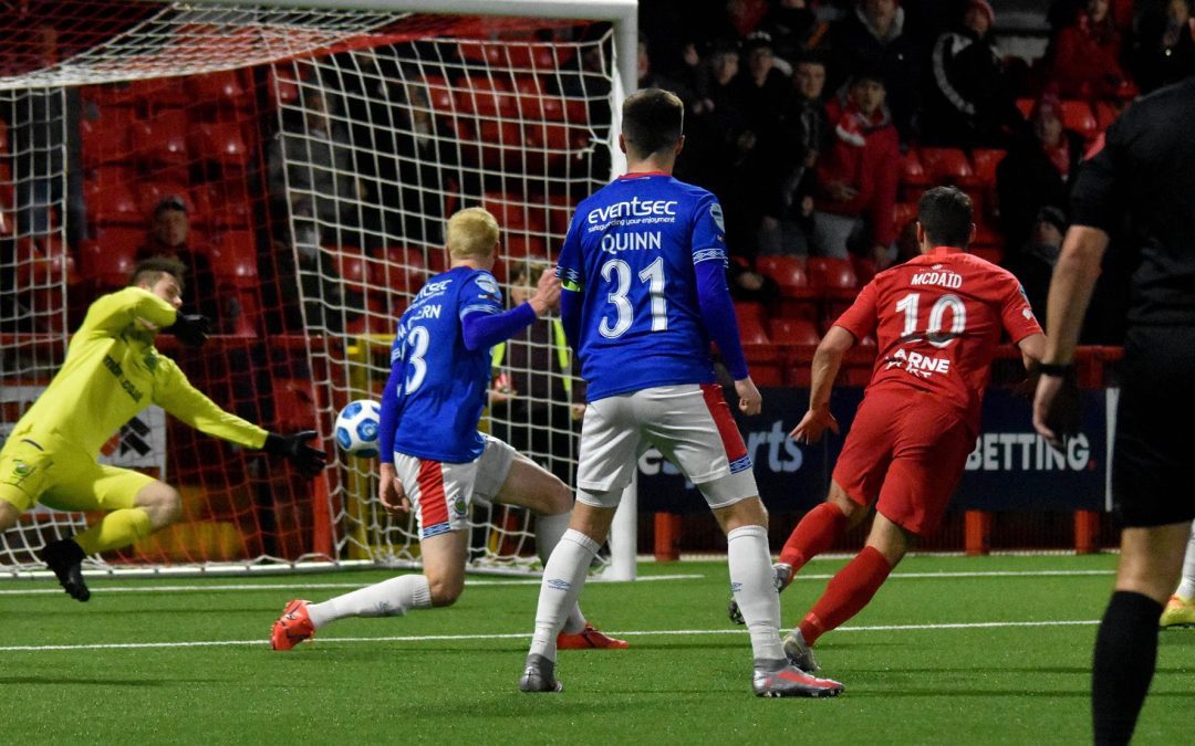 Rampant Reds defeat 10-man Blues to seal Shield final berth