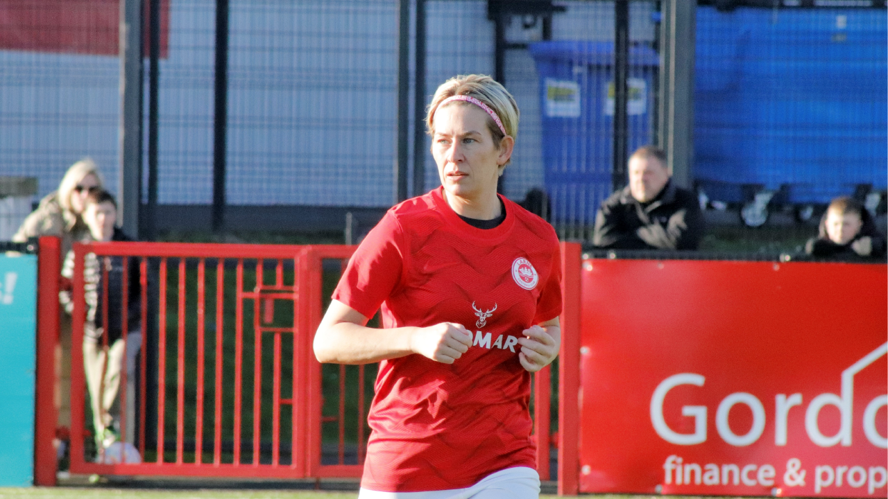 Laura Noble playing for Larne Women Olympic.