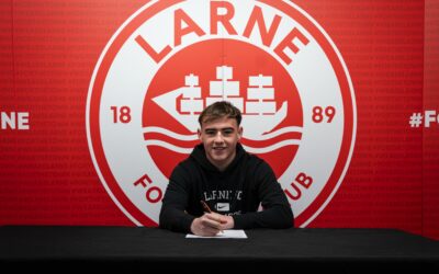 Mikey Harkin signs his first professional contract